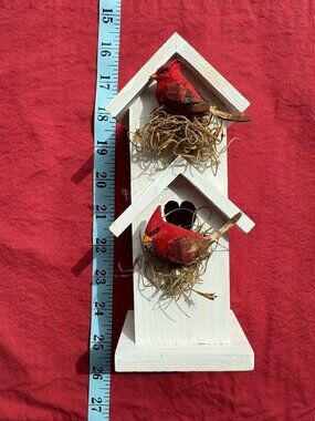White wooden decorative birdhouse with 2 cardinals